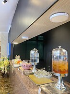 Adia Convention Center Hotel