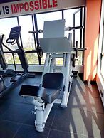 Luxurious Nairobi Condo With Rooftop Pool & Gym