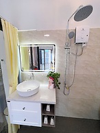 The Cafe Apartment Building