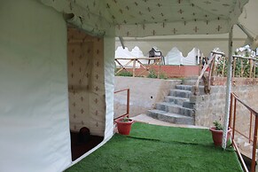 Billing View Camp and Mud Houses