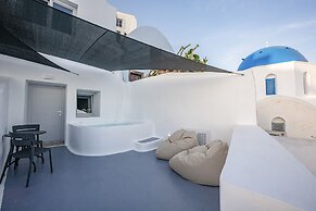 Three Domes Oia - an Iconic Collection