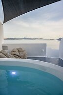 Three Domes Oia - an Iconic Collection
