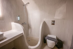 Three Domes Oia - an Iconic Collection