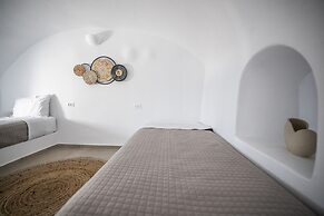 Three Domes Oia - an Iconic Collection