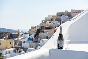 Three Domes Oia - an Iconic Collection