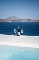 Three Domes Oia - an Iconic Collection