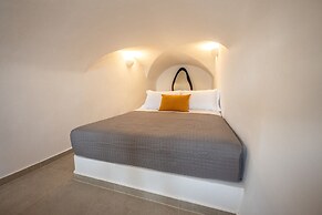 Three Domes Oia - an Iconic Collection