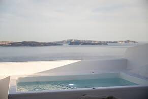 Three Domes Oia - an Iconic Collection
