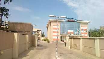 Global Village Hotel and Suites