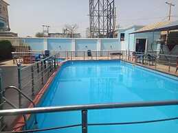 Global Village Hotel and Suites