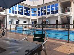 Global Village Hotel and Suites