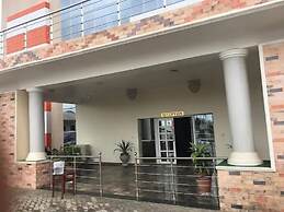 Global Village Hotel and Suites