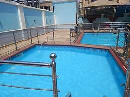 Global Village Hotel and Suites