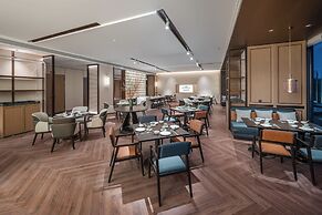 Howard Johnson By Wyndham Guotou Plaza Zigong