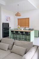 Tropical Poolside Retreat by Sea N' Rent