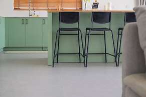 Tropical Poolside Retreat by Sea N' Rent