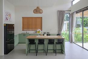 Tropical Poolside Retreat by Sea N' Rent