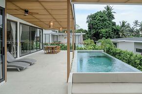 Tropical Poolside Retreat by Sea N' Rent