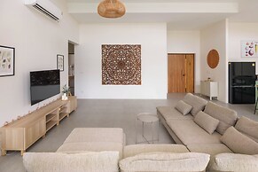 Tropical Poolside Retreat by Sea N' Rent