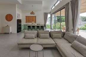 Tropical Poolside Retreat by Sea N' Rent