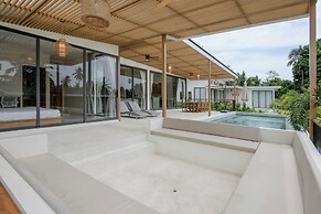 Tropical Poolside Retreat by Sea N' Rent