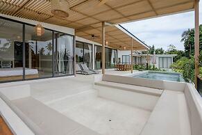 Tropical Poolside Retreat by Sea N' Rent