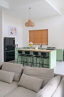 Tropical Poolside Retreat by Sea N' Rent