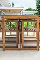 Tropical Poolside Retreat by Sea N' Rent