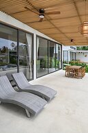 Tropical Poolside Retreat by Sea N' Rent
