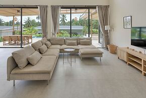 Tropical Poolside Retreat by Sea N' Rent