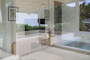 Tropical Poolside Retreat by Sea N' Rent