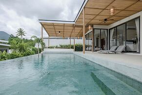 Tropical Poolside Retreat by Sea N' Rent