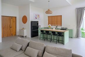 Tropical Poolside Retreat by Sea N' Rent