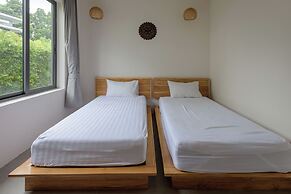 Tropical Poolside Retreat by Sea N' Rent