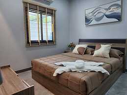 Songmee Pool Villa Nikompattana