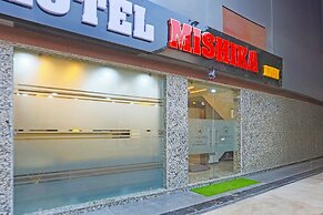 Fabhotel Mishika Inn