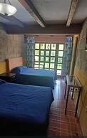 Los Pocitos Cabañas y Hotel