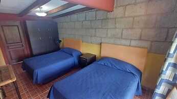 Los Pocitos Cabañas y Hotel