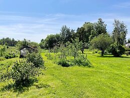 Charming Garden Cottage in Levide