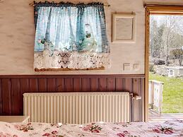 Charming Garden Cottage in Levide