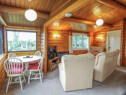 Y Bwthyn Pren, Cabin 209,