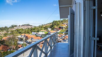 Casa com Lareira Wi-fi e Varanda com Vista