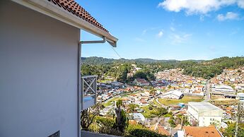 Casa com Lareira Wi-fi e Varanda com Vista