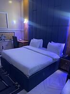 DE ROSS HOTEL & SUITES