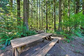 Three Enchanting Riverfront Cabins: Hot Tub Access