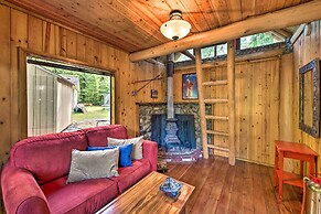 Three Enchanting Riverfront Cabins: Hot Tub Access