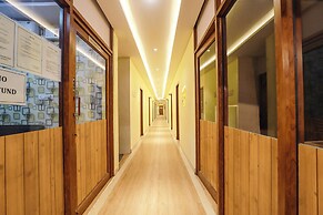 FabHotel Joy Residency
