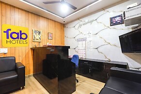 FabHotel Joy Residency