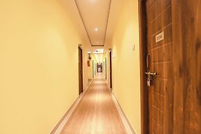 FabHotel Joy Residency