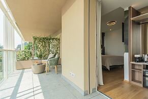 Pureview Luxury Suites, with breakfast & pool by Rent all Como